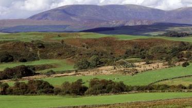 View north over farmland looking towards Cairnsmore of Fleet NNR. Dumfries and Galloway NNR.  :copyright:Lorne Gill/SNH D18/08418