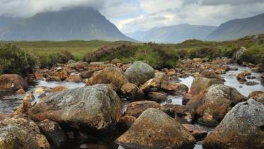 A rocky stream and the Buchaille Etive Mor from Rannoch Moor.  :copyright:Lorne Gill/NatureScot