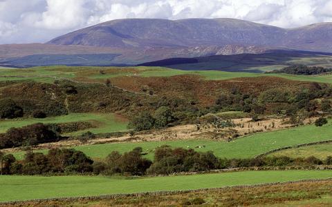 View north over farmland looking towards Cairnsmore of Fleet NNR. Dumfries and Galloway NNR.  :copyright:Lorne Gill/SNH D18/08418